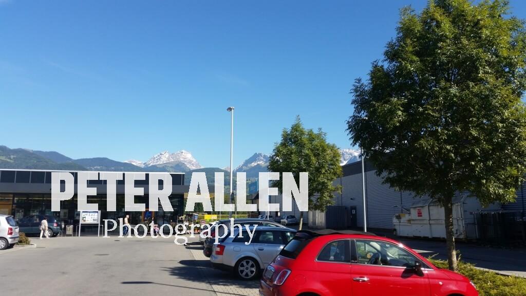 In a Aldi car park surrounded by mountains